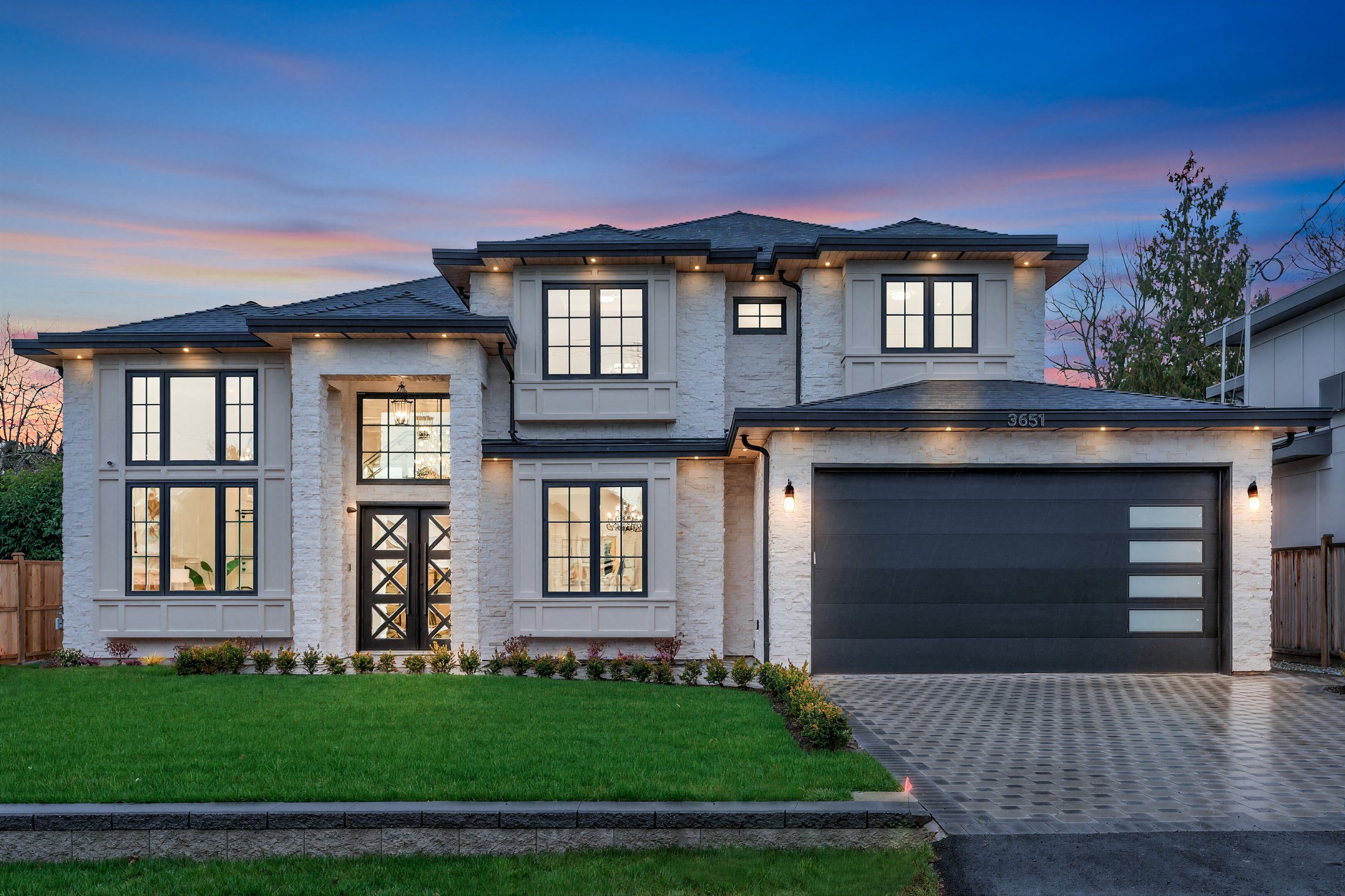 Estate home at twilight, South Surrey